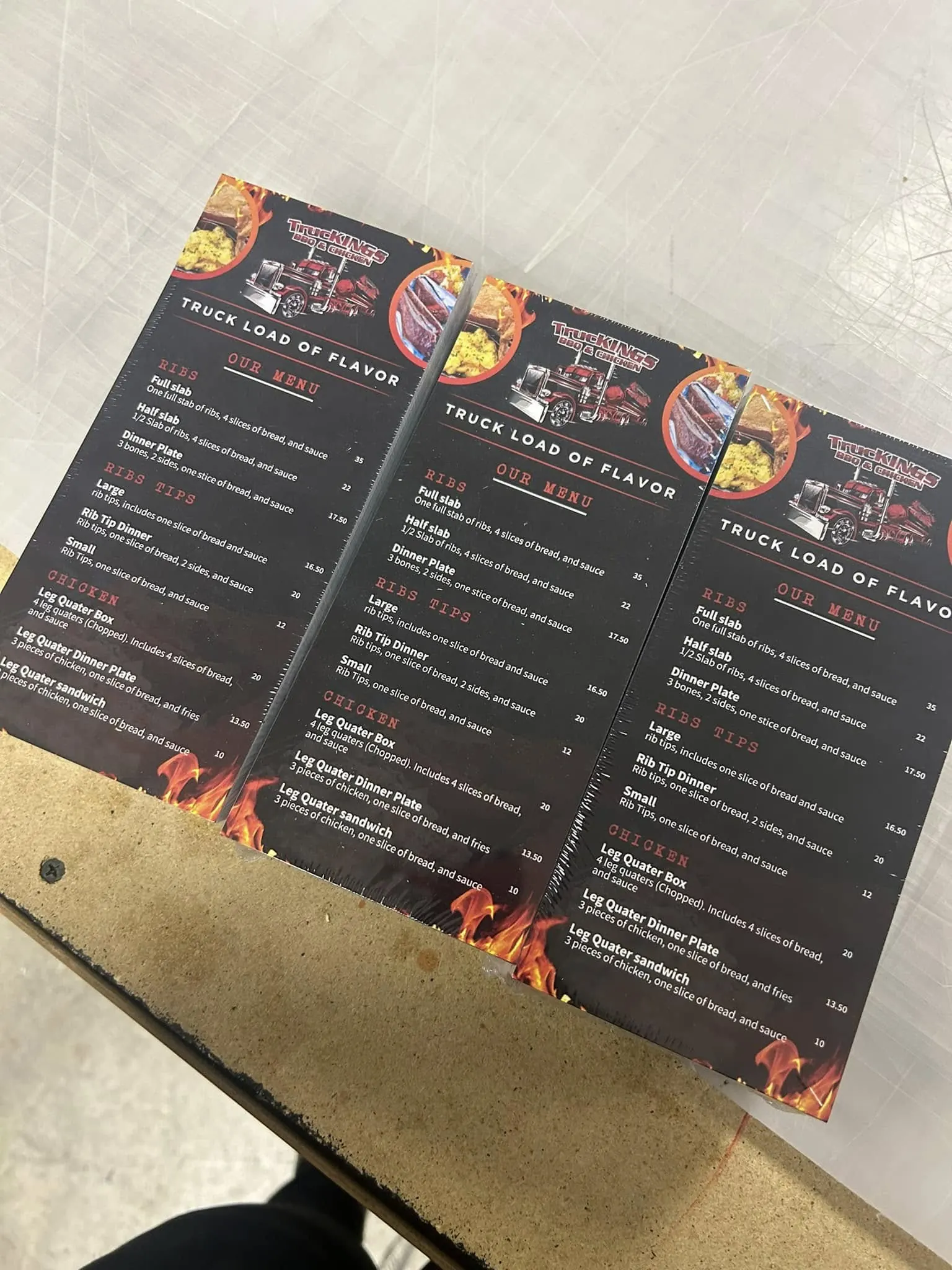 Close-up of a tri-fold restaurant menu brochure produced by Fontz Graphics Designs