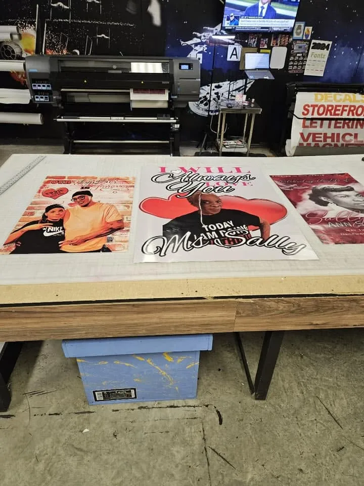 Large-format printers running in the Fontz Graphics Designs production shop