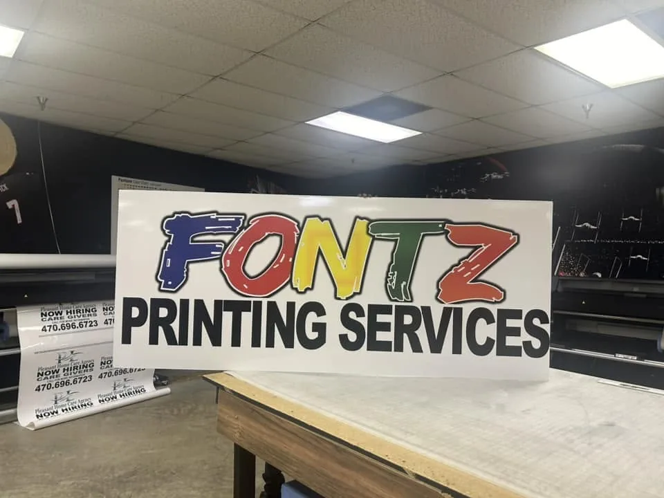 Production equipment and vinyl stock inside the Fontz Graphics Designs shop