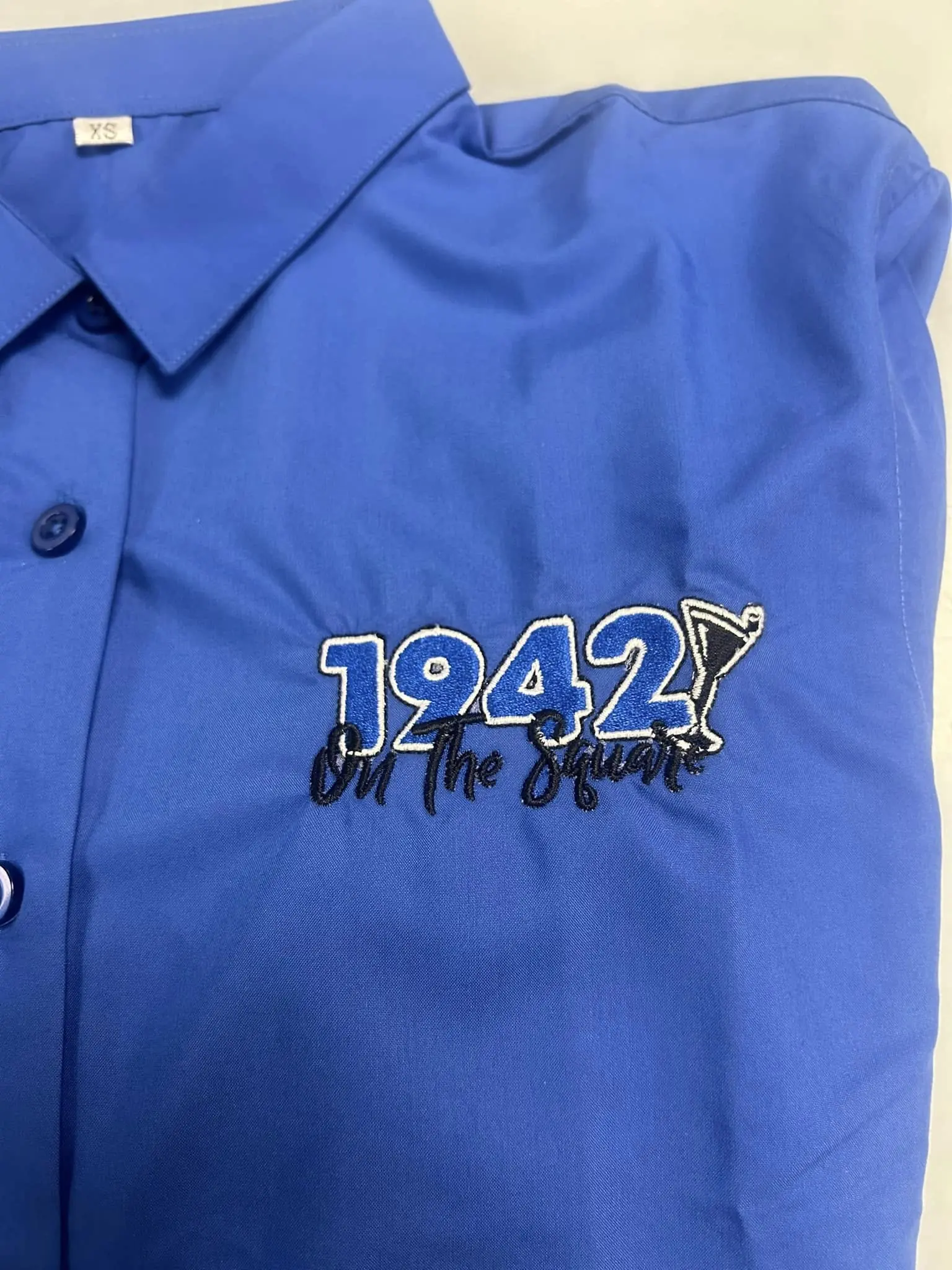 Custom embroidered button-up uniform shirt by Fontz Graphics Designs