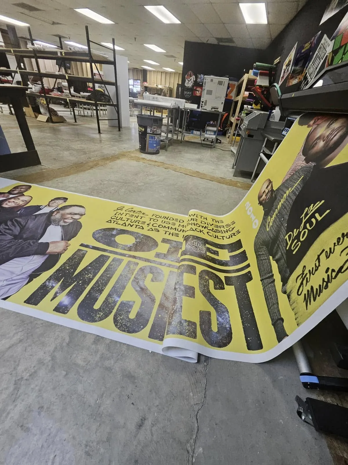 Large-format vinyl banner in production at the Fontz Graphics Designs shop